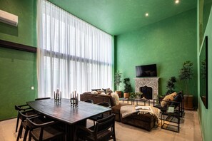 Luxury House | Living area | 50-inch TV with cable channels, fireplace, Netflix - Downtown Luxury 5BR Home Rooftop Views (San Miguel de Allende)