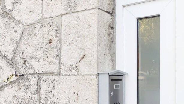 A stone wall with a blue sign indicating the number 14. - 1 bdr Apt, Kupres, centar, beautiful and uniqe plase (Kupres)