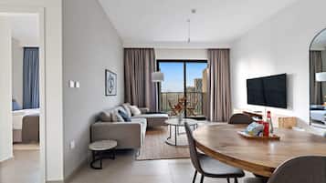 Exclusive Apartment | Living area | 51-inch LED TV with cable channels