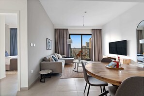 Exclusive Apartment | Living area | 51-inch LED TV with cable channels - Silkhaus Executive Residences, Dubai Hills (Dubai)