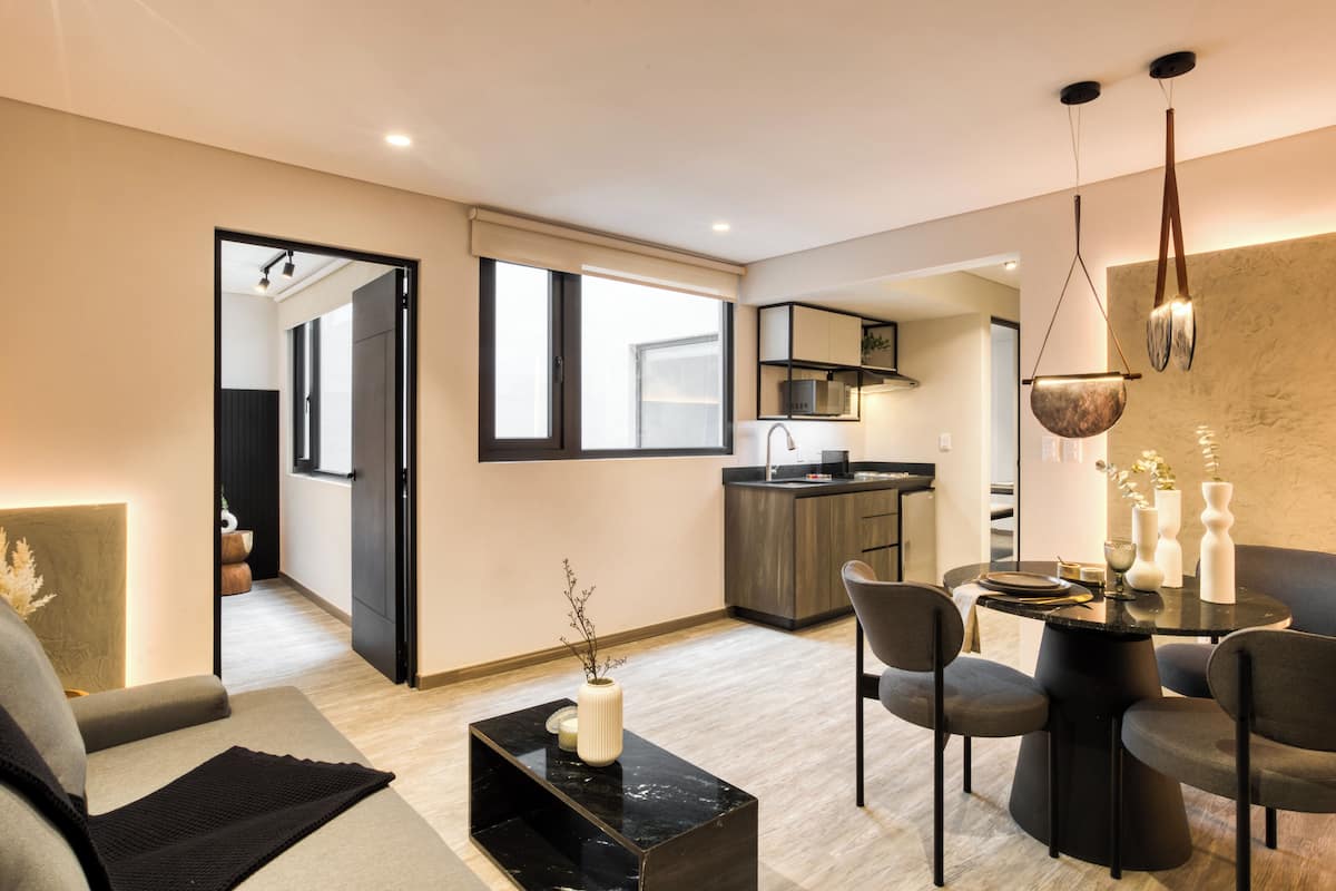 Family Apartment | Living area | 50-inch Smart TV with digital channels, Netflix, streaming services