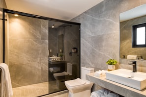 Master Penthouse with a Private Terrace | Bathroom | Shower, rainfall showerhead, hair dryer, towels