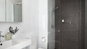 Shower, hair dryer, towels