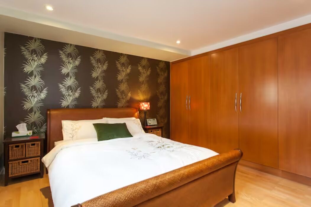 Well appointed bedroom with plenty of cupboard space
