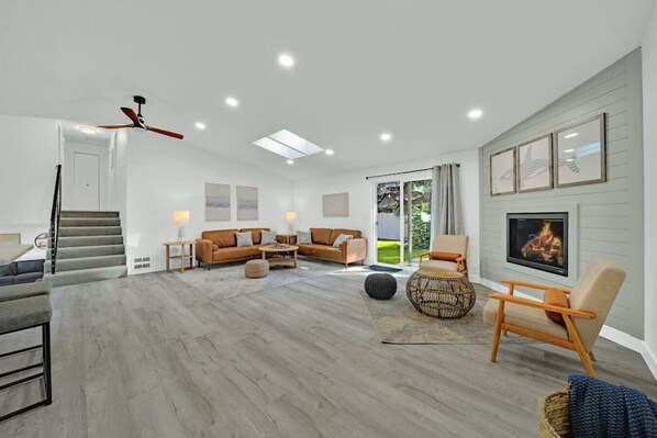Smart TV, fireplace, foosball, books
