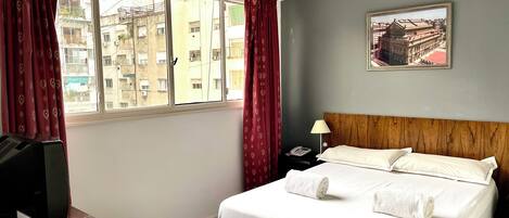 Standard Double Room | Bathroom | Shower, hair dryer, towels, soap