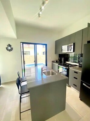 Private kitchen - A space for the enjoyment of the family created with much love. (La Altagracia)