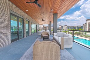 Property relaxing second floor balcony.  - DFW Elevator 2bd 2bth Ext Patio Zen Place futon couch I35 easy access elevators  (Fort Worth)