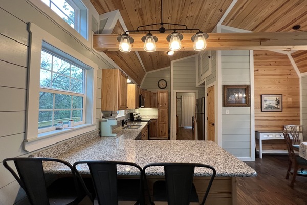 Kitchen buffet with bar stools