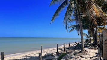 On the beach, sun loungers, beach towels