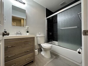 Shower, hair dryer, towels, toilet paper - Under the Oaks Un-refined Florida Living  (LaBelle)
