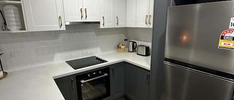 Appartamento Premium, 2 camere da letto | Cucina privata | Frigorifero con congelatore, microonde, forno, piano cottura