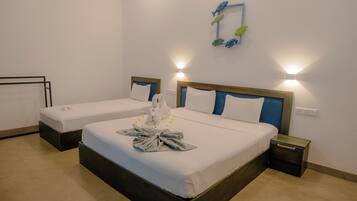 Tabla de planchar con plancha, wifi gratis y ropa de cama