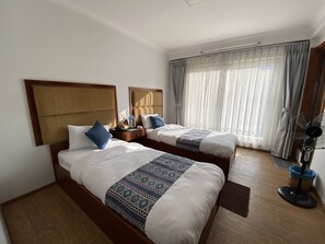 Hair dryer, towels, soap, shampoo