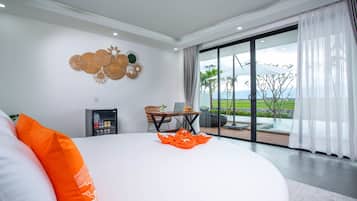 Premium Suite, 1 Bedroom, Non Smoking, Garden View | Living room | 55-inch Smart TV with digital channels