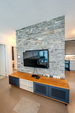 Superior Penthouse | Living area | 50-inch Smart TV with cable channels - Geula 1  (Tel Aviv)