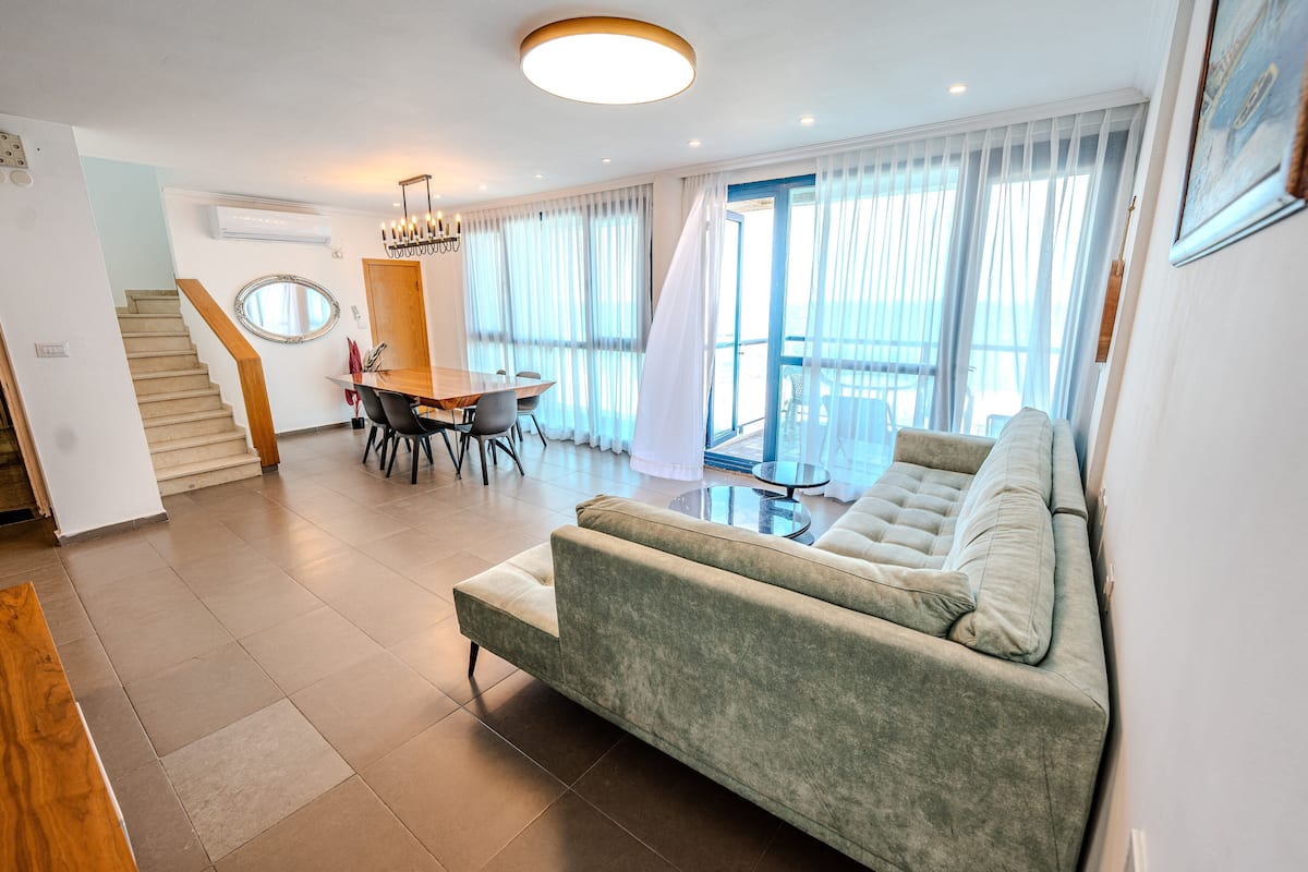 Superior Penthouse | Living area | 50-inch Smart TV with cable channels