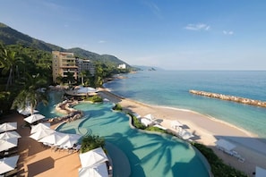 3 outdoor pools, pool umbrellas, pool loungers - Garza Blanca Preserve Spa & Resort Puerto Vallarta (Puerto Vallarta)