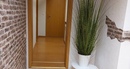 Ferienwohnung "Fewo 2 - Osterberg" mit Privatterrasse, Gemeinschaftsgarten und WLAN
