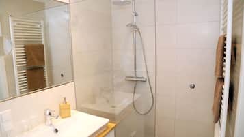 Shower, free toiletries, hair dryer, towels