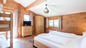 4 habitaciones, tabla de planchar con plancha y acceso a internet