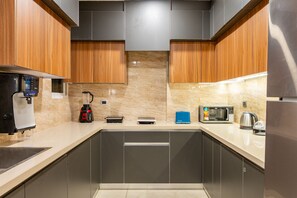 Fridge, microwave, electric kettle, toaster