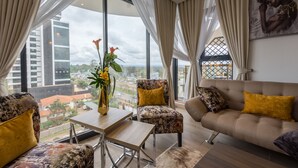 Comfort Apartment | Ruang tamu | TV Pintar 