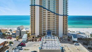 A high-rise hotel with a view of the beach and ocean. - Seychelles 2103 (Panama City Beach)