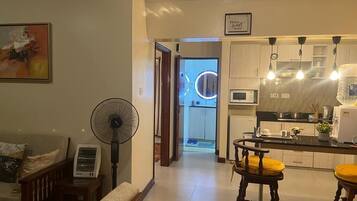 Comfort Apartment | Living area | 24-inch Smart TV with digital channels