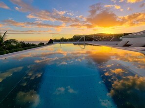 Outdoor pool, pool umbrellas, pool loungers