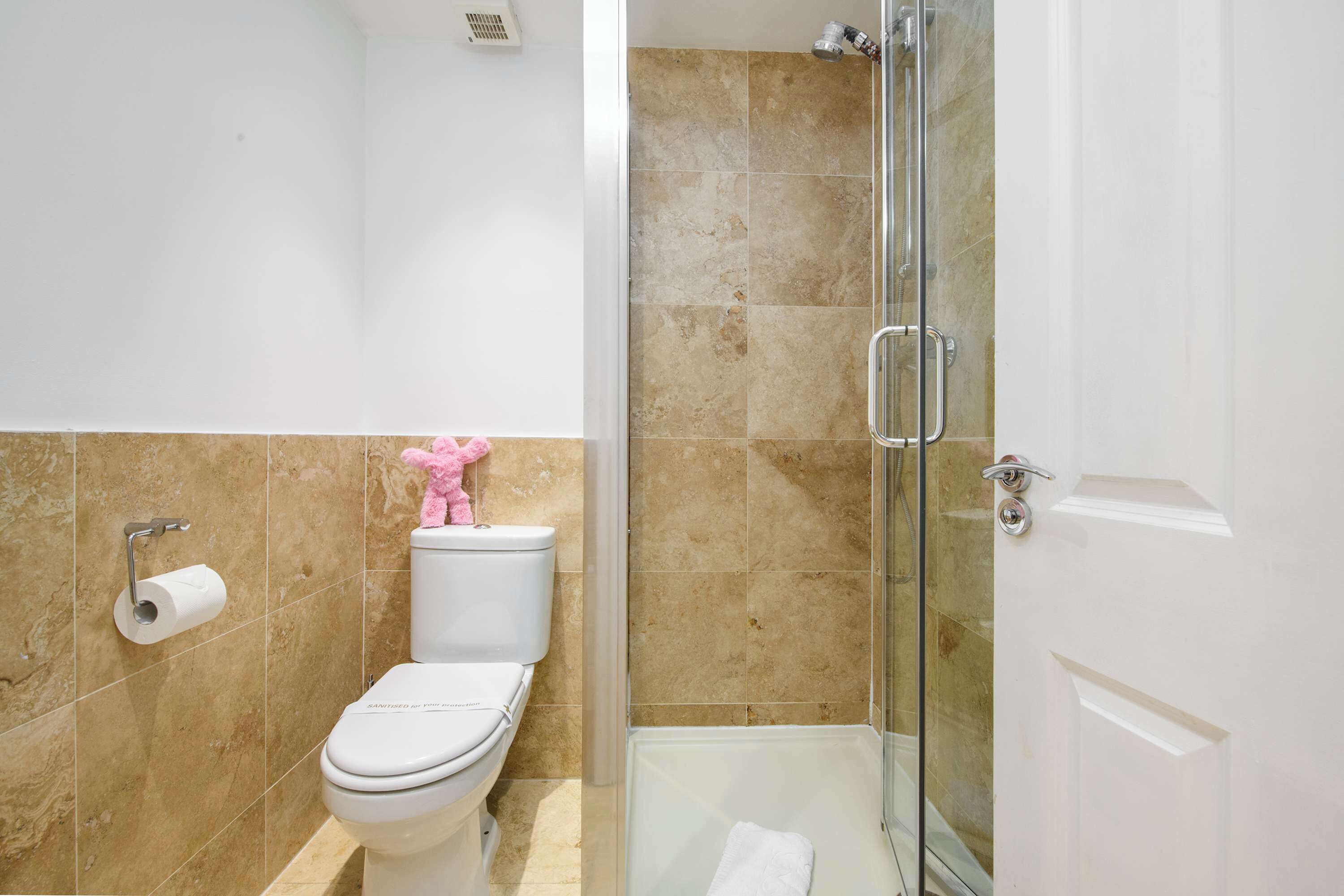 Shower, hair dryer, towels, shampoo