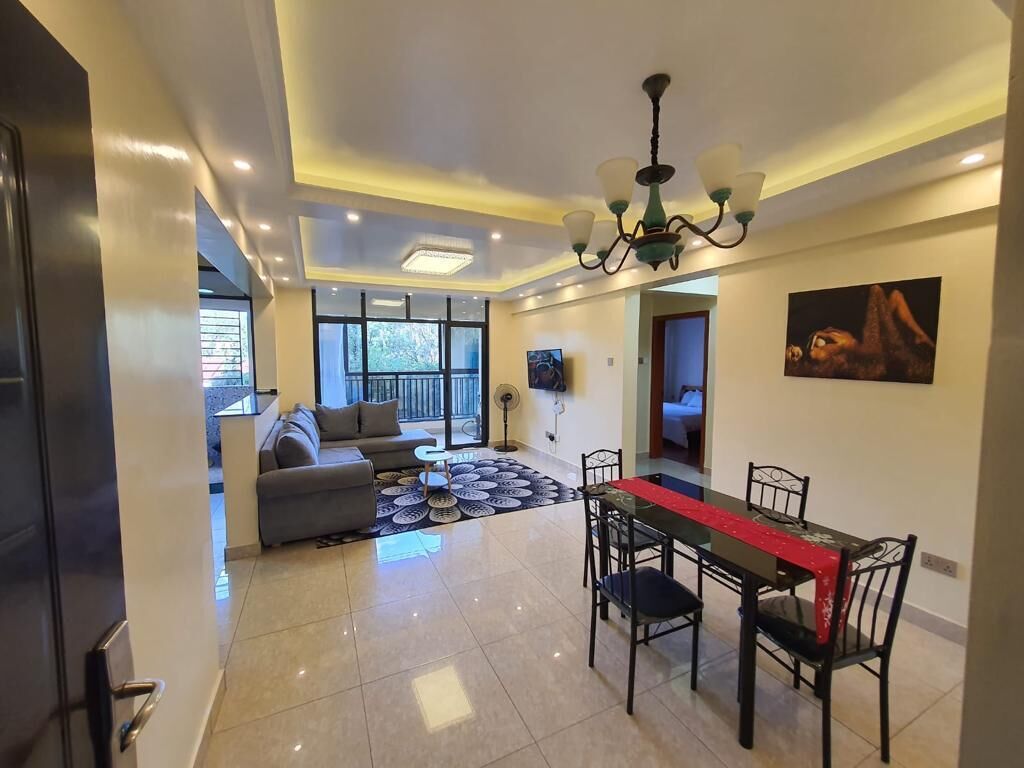 Comfort Apartment | Living area | 24-inch Smart TV with digital channels