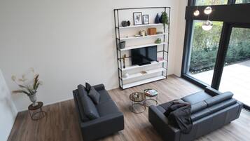 City Duplex | Living area | Flat-screen TV