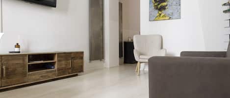 Apartment | Living area | 50-inch LCD TV with cable channels