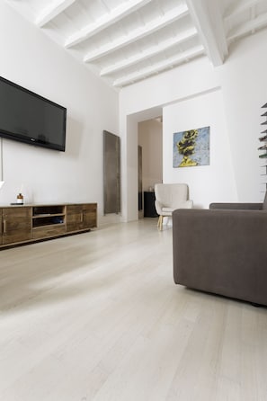 Apartment | Living area | 50-inch LCD TV with cable channels - Stylish Apartment Close To Piazza Navona (Rome)