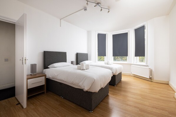 2 slaapkamers, een strijkplank/strijkijzer, gratis wifi, beddengoed