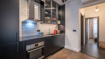 Apartment | Private kitchen | Fridge, oven, stovetop, dishwasher
