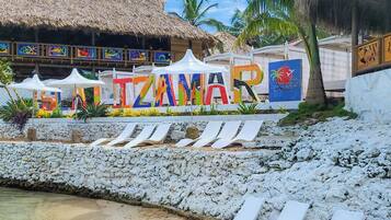 Private beach, white sand, sun-loungers, beach umbrellas
