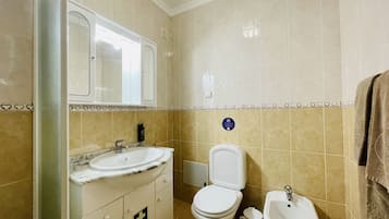 Shower, hair dryer, soap, shampoo