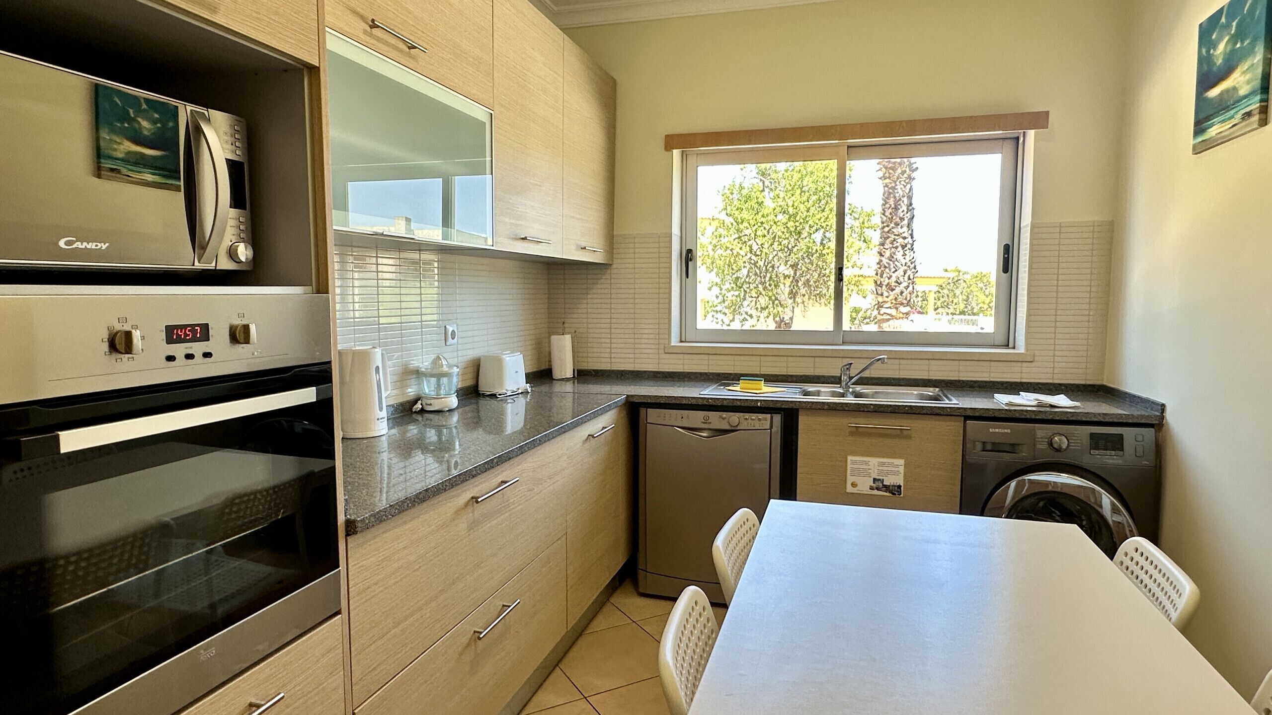 Coffee/tea maker, fridge, microwave, oven