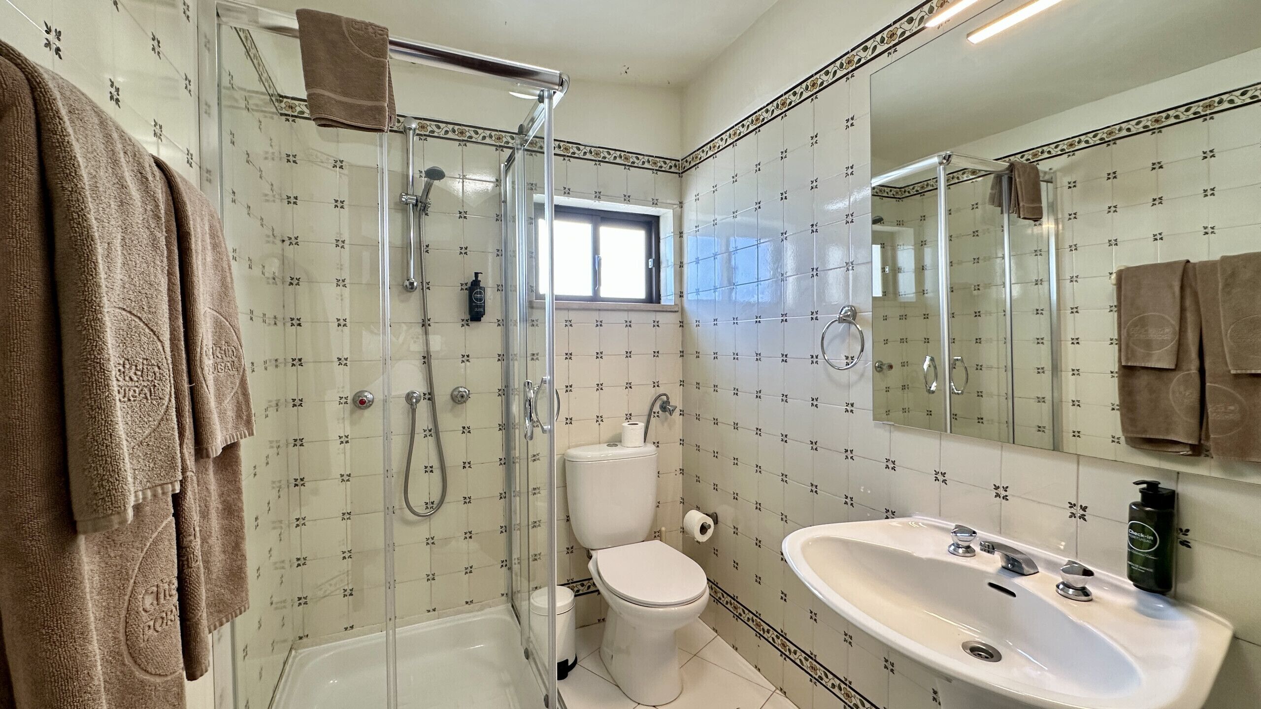 Shower, hair dryer, soap, shampoo