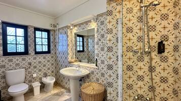 Shower, hair dryer, soap, shampoo