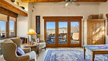 TV, fireplace, books, offices