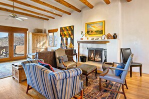 TV, fireplace, books, offices