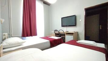 Standard Triple Room | Desk, laptop workspace, free WiFi, bed sheets