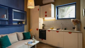 City Studio Suite, 1 Bedroom, Ground Floor | Private kitchen | Full-sized fridge, oven, stovetop, dishwasher