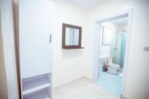 Apartment, 1 Queen Bed | Bathroom | Shower, towels