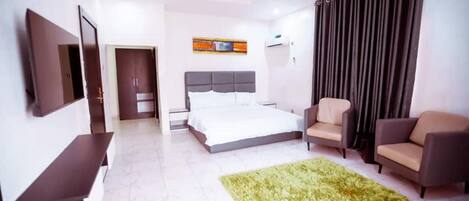 Apartamento, 2 camas Queen | 2 quartos, ferros/tábuas de passar roupa, Wi-Fi de cortesia