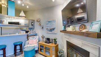 Apartment (1 Bedroom) | Living area | TV, fireplace, DVD player