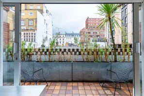 Apartamento básico, 1 cama de matrimonio grande | Jardines del alojamiento